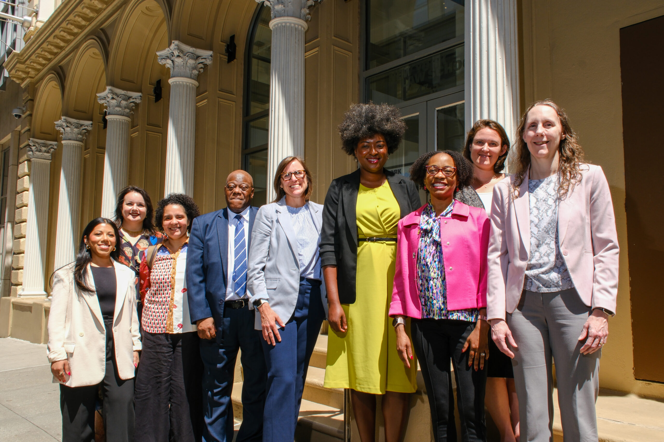 Group of CFR staff standing outside of CFR's Manhattan office