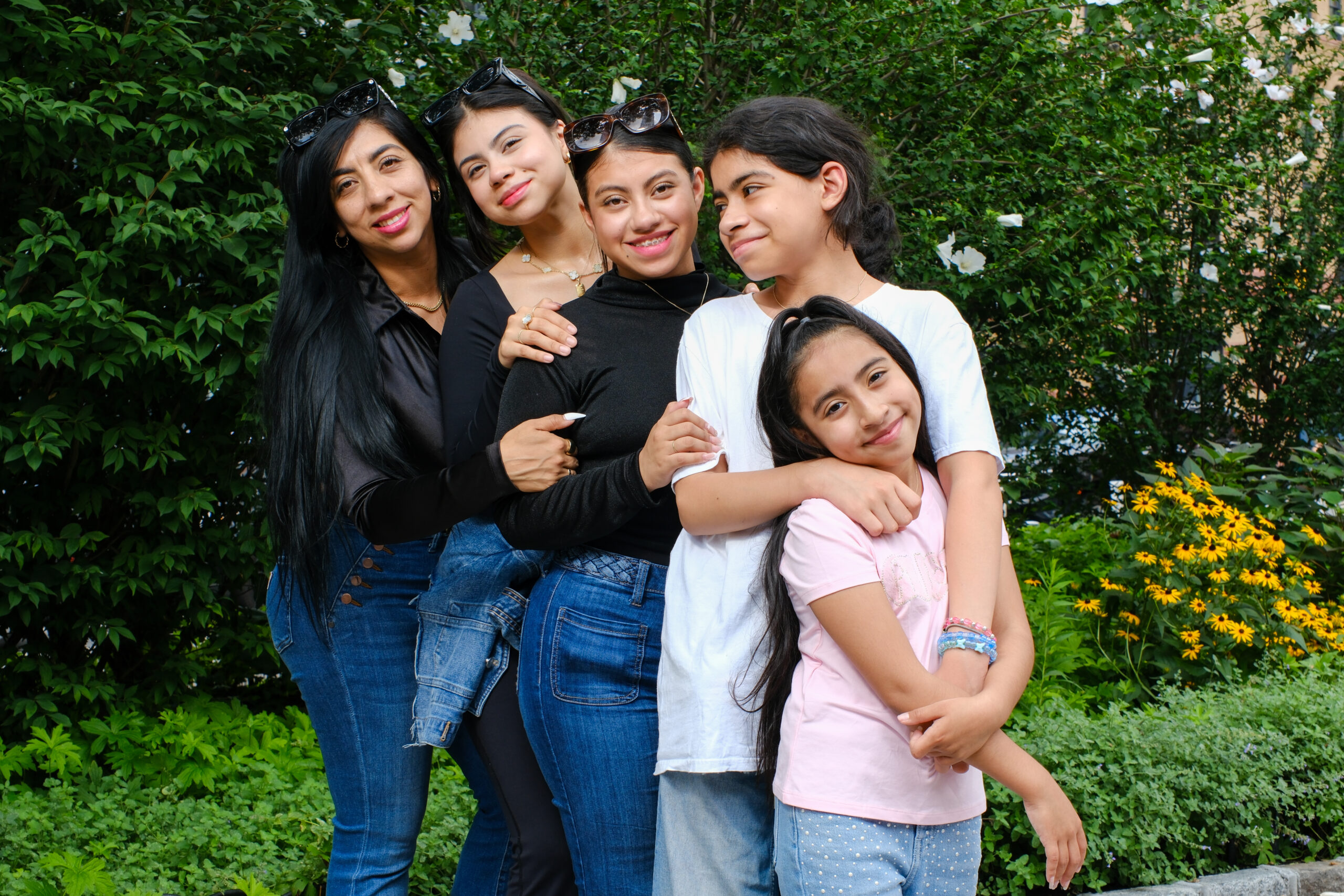 Family of five: a mother with her three daughters and son