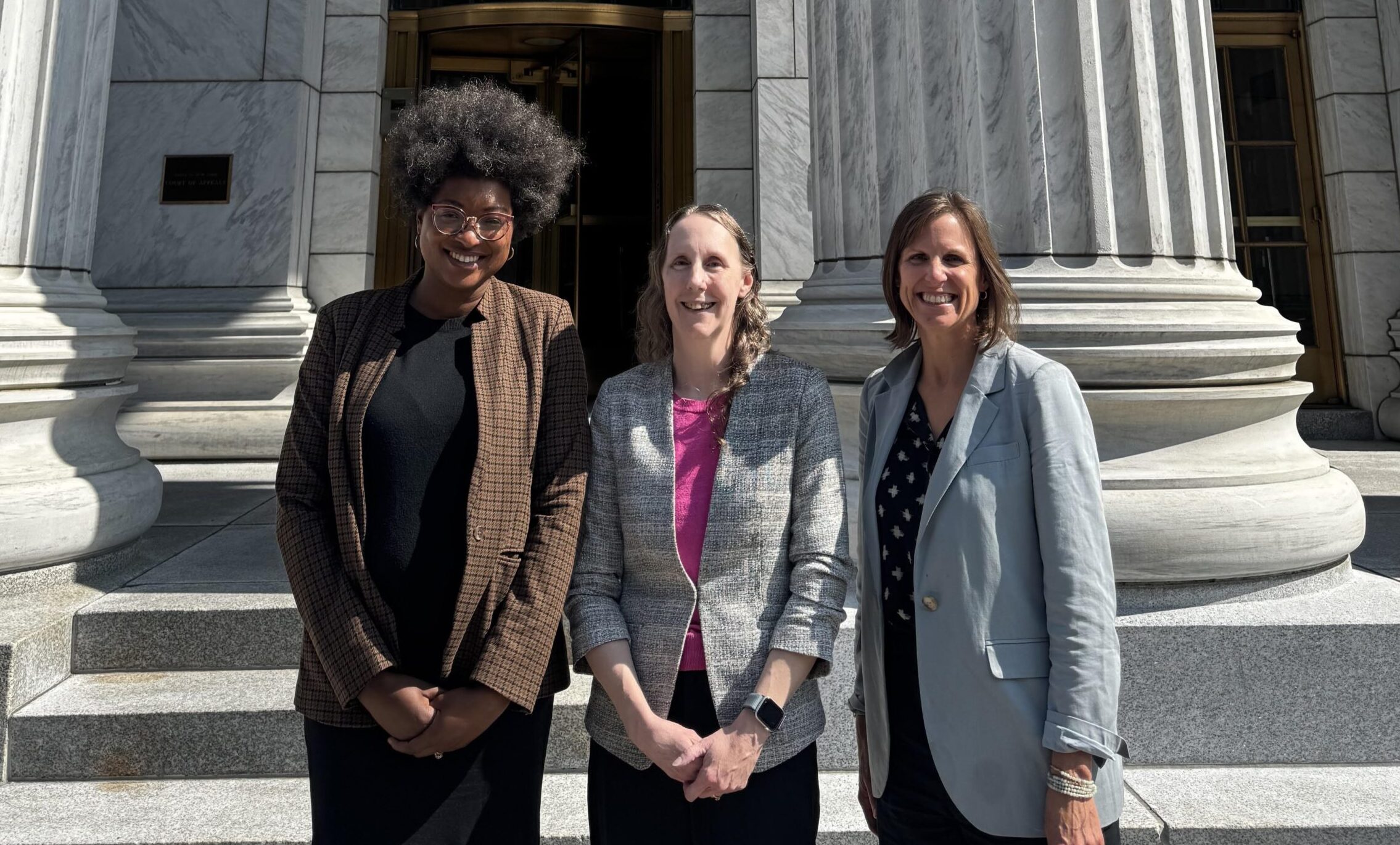CFR staff standing in front of the Court of Appeals